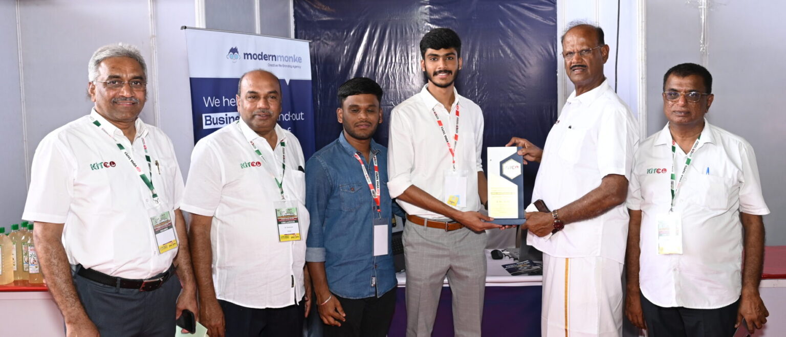 Kitco Expo 2 Modernmonke - Creative Re-Branding Agency We help Businesses Stand-out using the power of Re-Branding. the founder of modernmonke getting award from the Kitco organization director